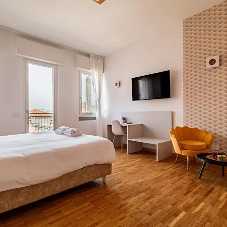 Penzion Urbanicooh Cavour Rooms&suite 3*